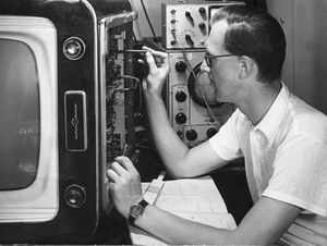 Person working on electronics